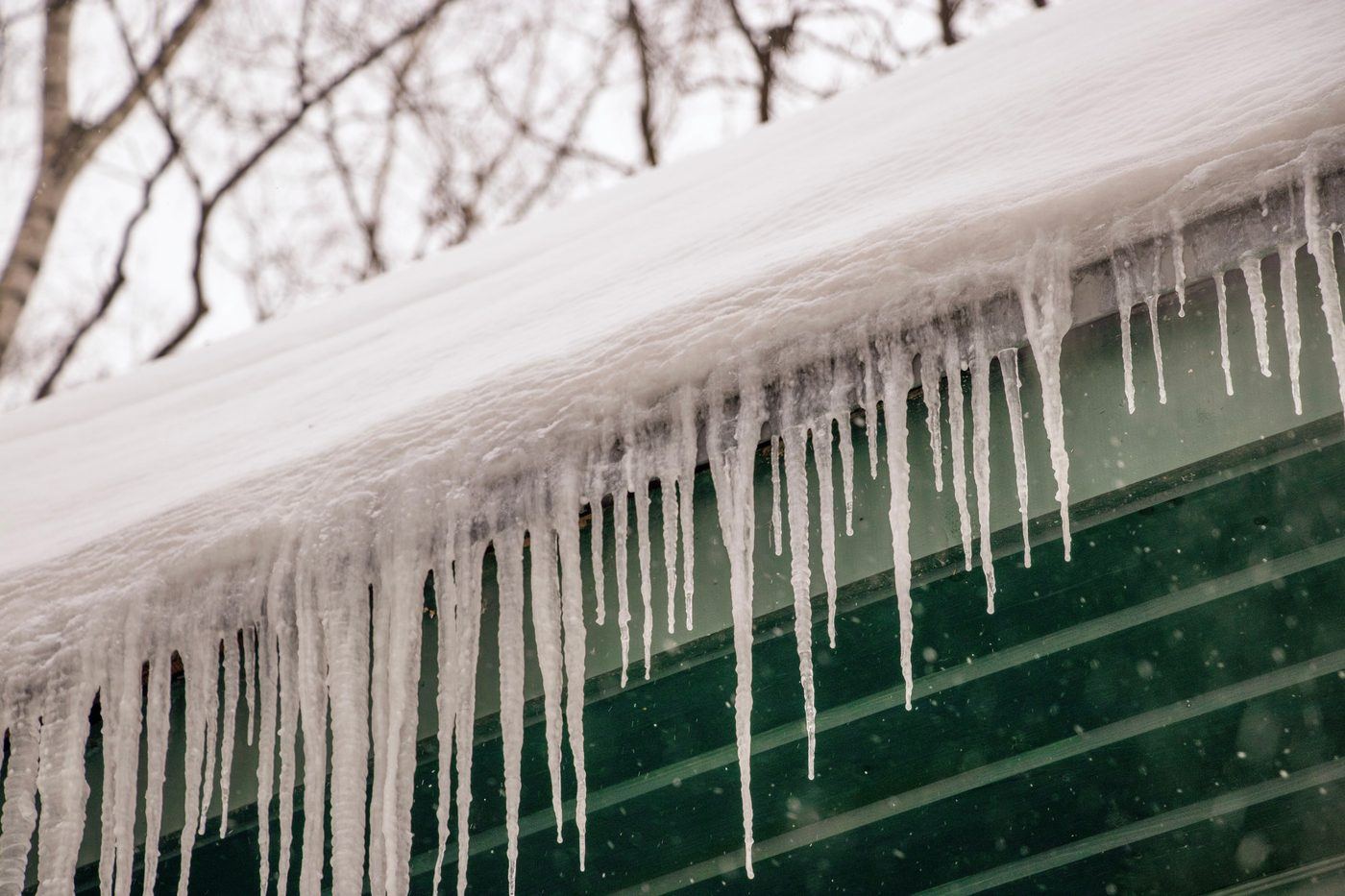Icicles hanging off a gutter after a freeze
