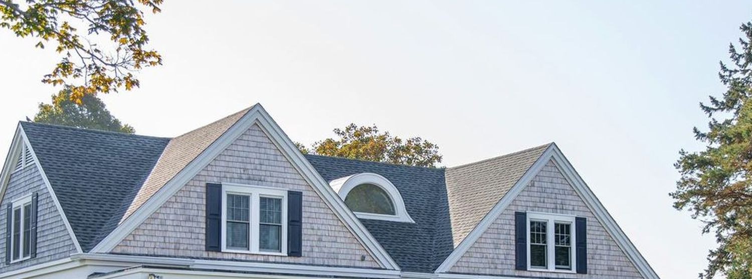 Shingle roof and dormers on a finished house