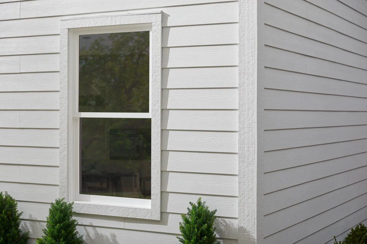 Clean lap siding and a properly wrapped window